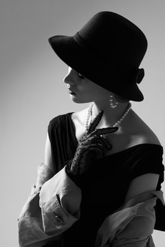 High fashion portrait of elegant woman in retro look.