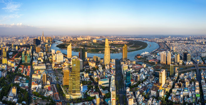 Top view aerial of Thu Thiem peninsula and center Ho Chi Minh City  with development buildings, transportation, energy power infrastructure. Financial and business centers in developed Vietnam