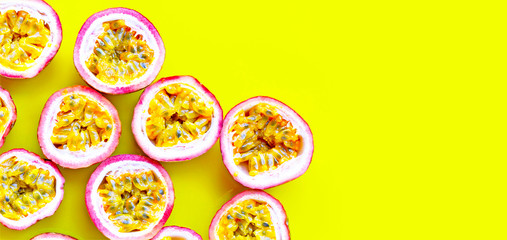 Passion fruit on yellow background.
