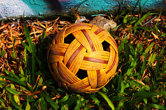 Sepak takraw ball placed on the grass