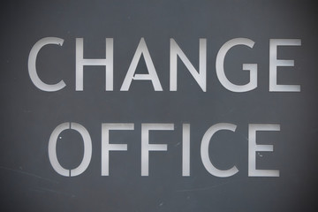 It says change office in white on gray background.