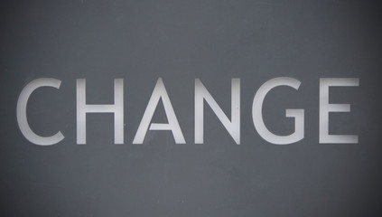 It says change in white on gray background.