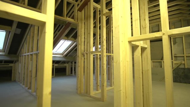 Inside a Construction Site with Wooden frames for the Stud walls in the building - View of the inside. Stock Video Clip Footage