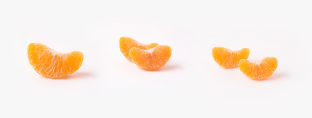 Close up slices of orange isolated on white background
