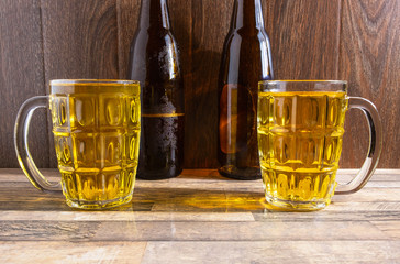 .Beer Glass and Beer Bottles on the Table
