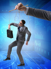 Businessman puppet being manipulated by boss
