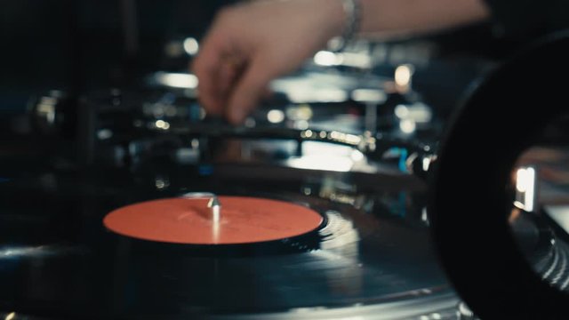 Outdoor music party. Dj playing on vinyl.