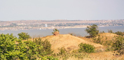 The ruins of ancient fortifications on  seashore