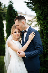 Bride and Groom on Wedding Day in city. Wedding couple after wedding ceremony.