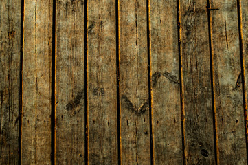 Wooden surface floor as texture grungy scratchy wood close up as retro vintage background