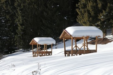 Wooden picnic gazebo in the snow-covered .Savsat/artvin/turkey