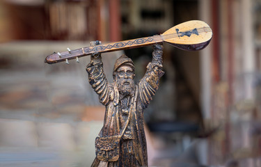Hacibektas, Nevsehir/Turkey-October 27 2019: Figurine of Pir Sultan Abdal hold baglama (musical...
