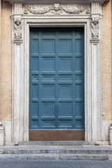 Fototapeta na wymiar ancient green wooden arched door, Italy Europe