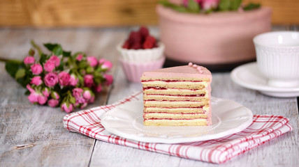 Slice Of Layered Creamy Fruit Cake. Raspberry Layer Cake.