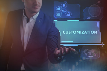 Business, Technology, Internet and network concept. Young businessman working on a virtual screen of the future and sees the inscription: Customization