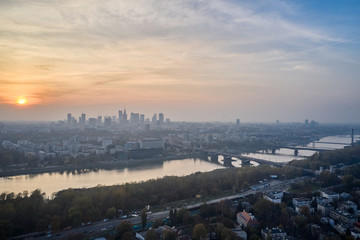Aerial view of skyscrapers in the center of the Warsaw at sunrise.