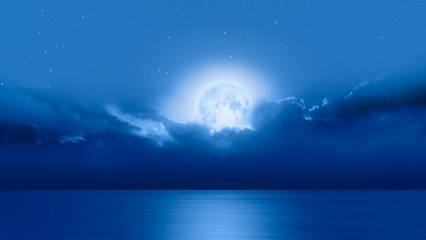 Fototapeta na wymiar Night sky with moon in the clouds 