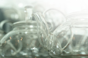transparent glass kettle for tea drinking relaxation blur white background