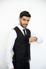 Naklejka premium Handsome young businessman with a friendly and smiling broadly with self-assured expression while holding hands meaning like in the studio against isolated white background.