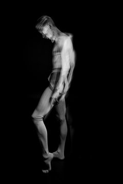 profile professional dancer with naked torso. Long exposure creative emotional series of photos. Black and white artistic work about feelings. sensitive romantic psychology. abstract poster