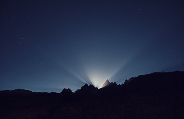 Moon light. Night mountain landscape. Alps, France.