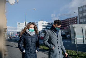 Obraz premium Coronavirus in city, prevention and protection concept.