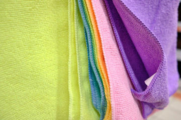 Fototapeta na wymiar Lots of multi colored micro fiber clothes