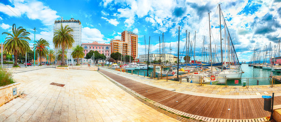 Splendid spring Cityscape with marina and Yachts and boats in town Cagliari