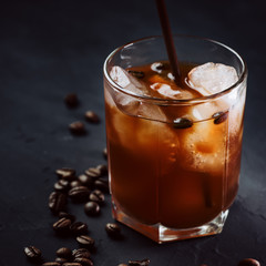 Black Russian cocktail with vodka, coffee and ice
