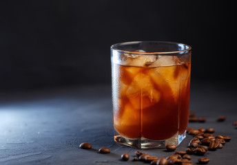 Black Russian cocktail with vodka, coffee and ice