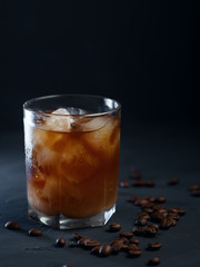 Black Russian cocktail with vodka, coffee and ice