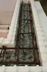 Close  up on insulating concrete forms ICF with metal reinforced concrete for house walls....