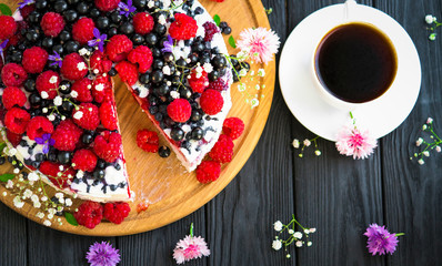.cheese cake and tea on a wooden background