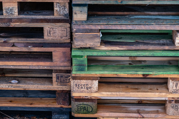 Old pallets stacked on top of eachother