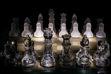 Chess board made of glass with clear and frosted pieces