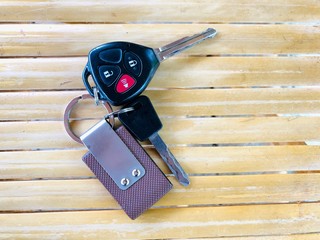 Remote car key on bamboo table