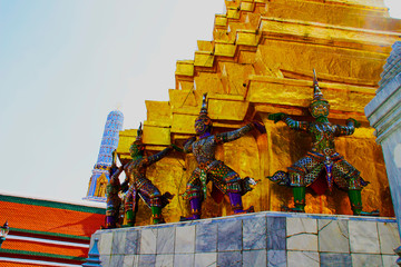 Sculptures in the temple in the Grand palace area. Bangkok, Thailand.