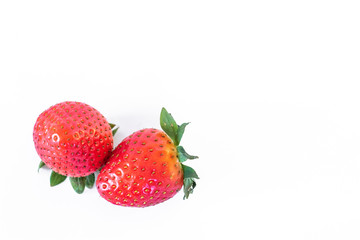 Large ripe strawberries isolated on white background