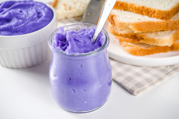 Ube Halaya. Halayang Ube. Trendy purple halaya yam jam, Filipino sweet and sour breakfast spread recipe, in different jar with toasted bread