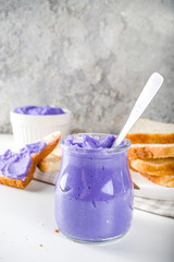 Ube Halaya. Halayang Ube. Trendy purple halaya yam jam, Filipino sweet and sour breakfast spread recipe, in different jar with toasted bread