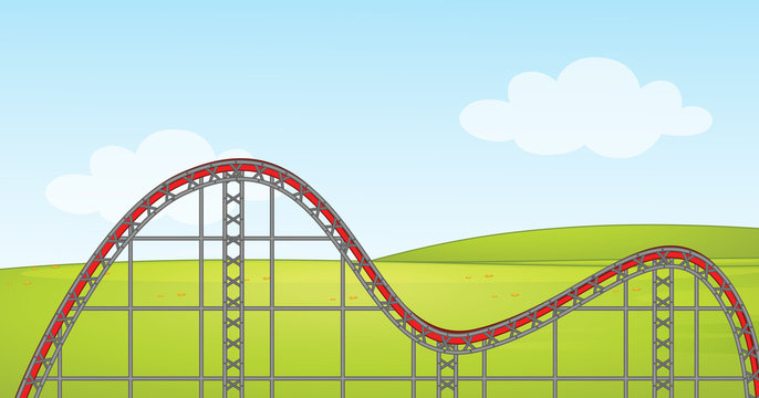 Scene with empty roller coaster track in the park