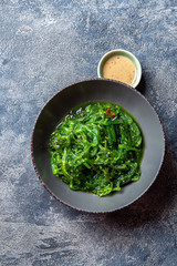 Chuka wakame, seaweed japanese salad with nuts sauce.