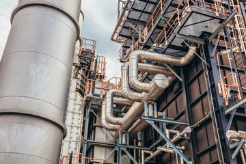 Industrial zone,The equipment of oil refining,Close-up of industrial pipelines of an oil-refinery...