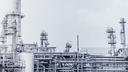 Industrial zone,The equipment of oil refining,Close-up of industrial pipelines of an oil-refinery plant,Detail of oil pipeline with valves in large oil refinery.