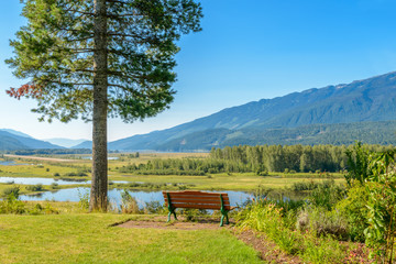 Picnic table at the beach of a lake, Vancouver, Canada