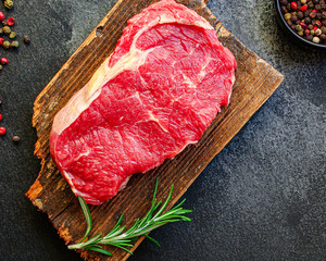 raw steak meat (beef or veal cooking) menu concept background. top view. copy spaces