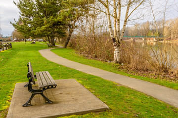 Fort-to-Fort Trail and picnic bench in Fort Langley Marine Park, Vancouver, Canada.