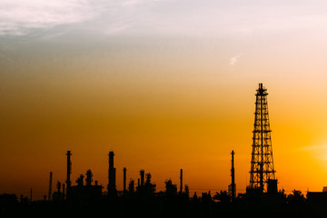 Obraz premium Oil refinery or petrochemical industry with ship in thailand. for Logistic Import Export background.