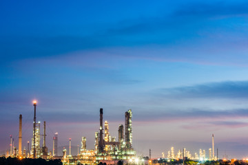 Obraz na płótnie Canvas Aerial view oil refinery night background during twilight,Industrial zone,Energy power station.