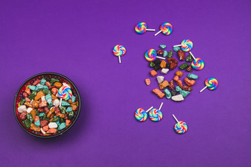 Lollipops and candies. candy bowl with sweets in the form of colored stones